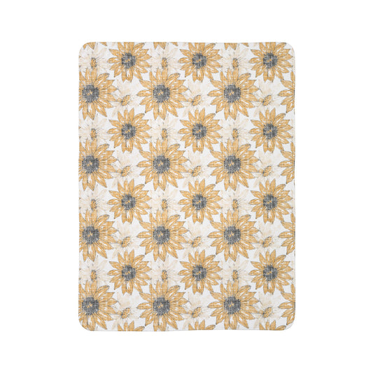 Sunflower fleece sherpa throw blanket, white base with repeating golden and blue flower heads