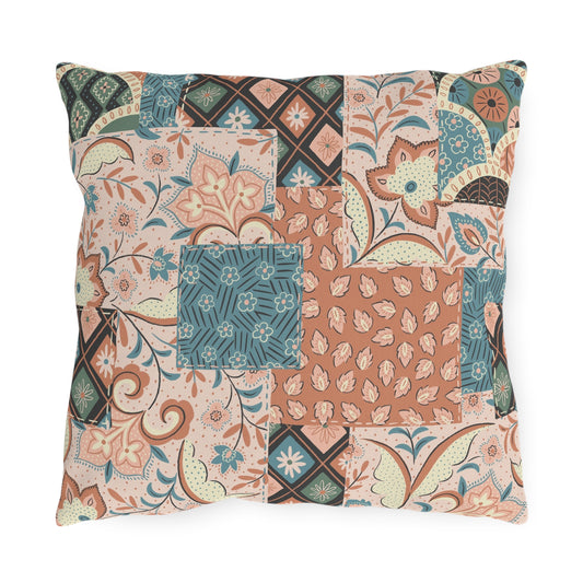 Patchwork floral throw pillow with teal, peach, and brown patterned squares