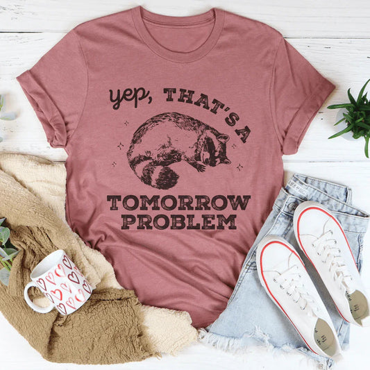 Mauve graphic tee with 'yep, that's a tomorrow problem' text and headphones cat