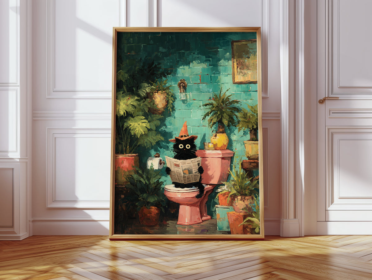 Framed cat reading newspaper artwork centered on a light wall with teal and plant colors
