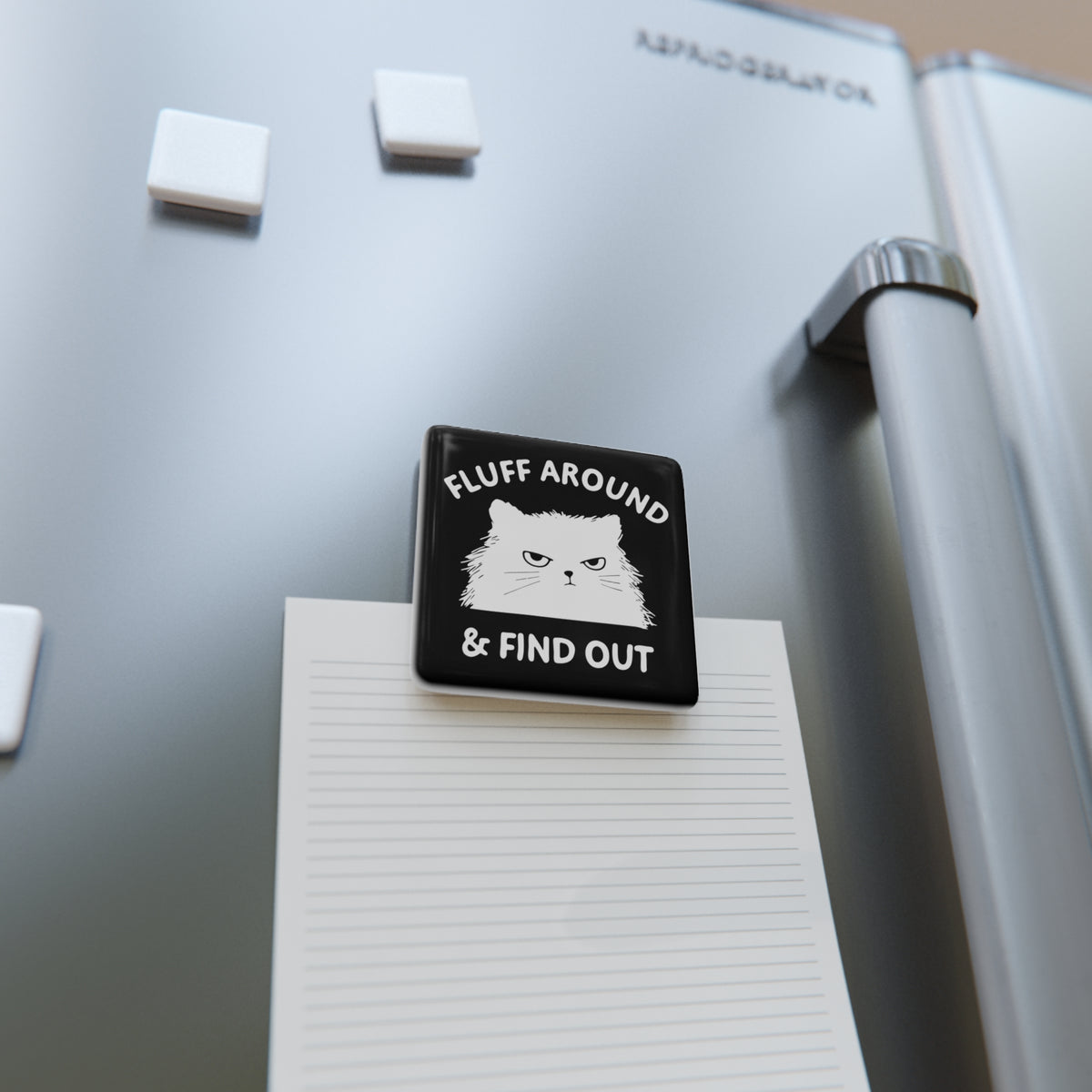 Square black cat magnet with cat face and 'FLUFF AROUND & FIND OUT' text