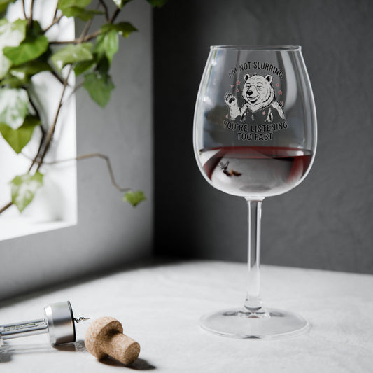 Clear wine glass with bulldog graphic and joke text, "You’re listening too fast"