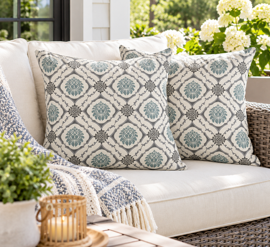 Set of two outdoor throw pillows with slate blue tile lattice pattern