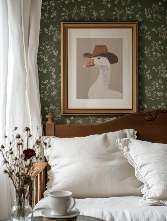 Brown framed wall art with a goose wearing a cowboy hat illustration