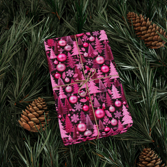 Pink gift wrap paper with ornament balls and pine tree icons, tied with twine