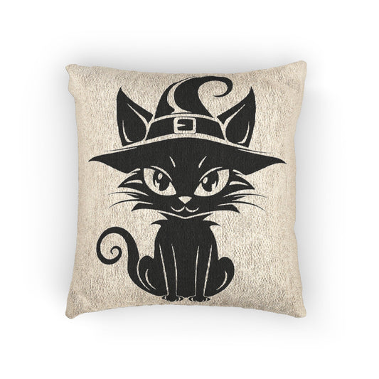Beige woven cat pillow with black witch hat and cat face illustration