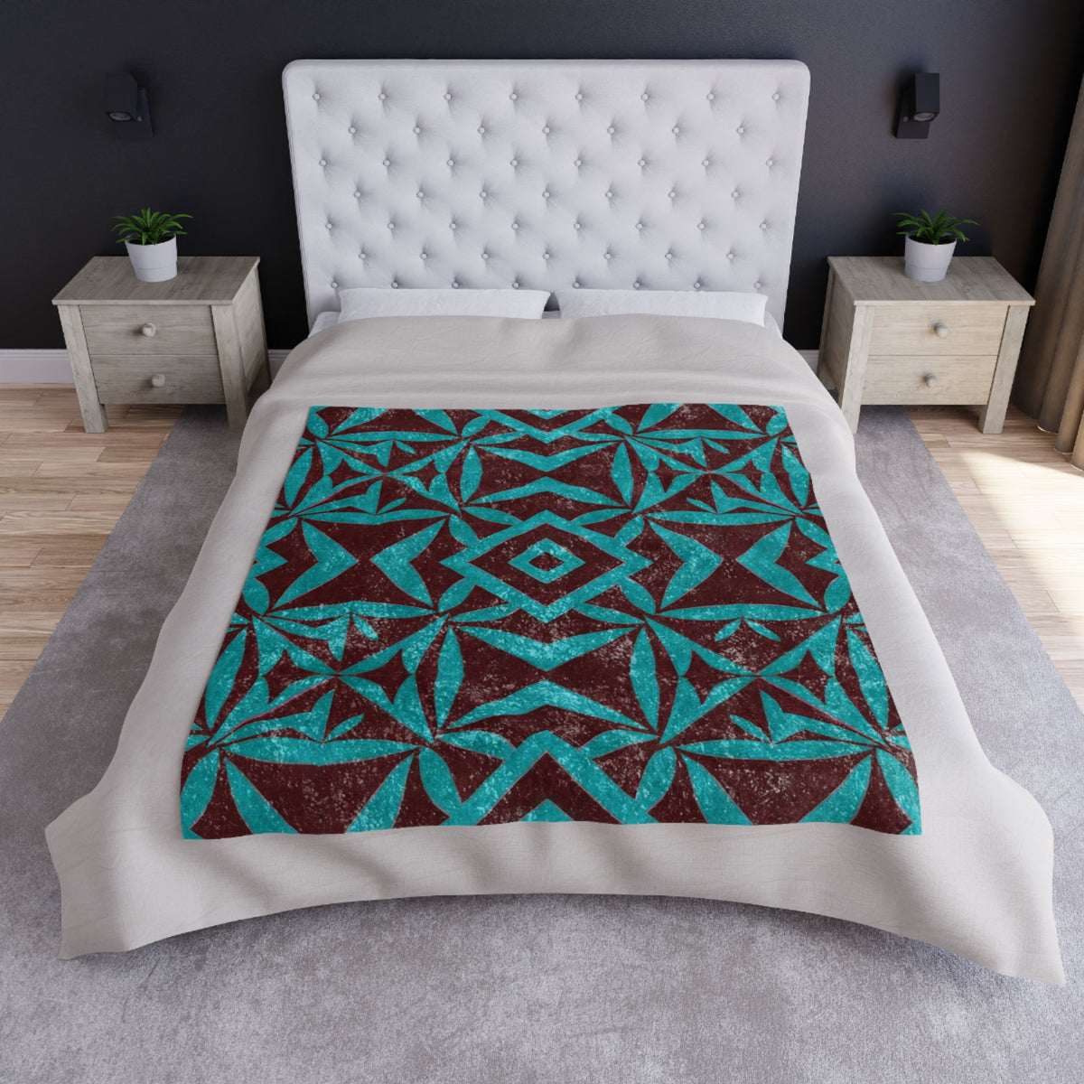 Crushed velvet blanket spread on bed, teal geometric tile pattern on dark brown