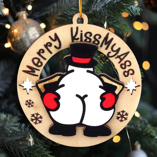 Christmas wooden ornament with round cartoon penguin, red earmuffs, black top hat