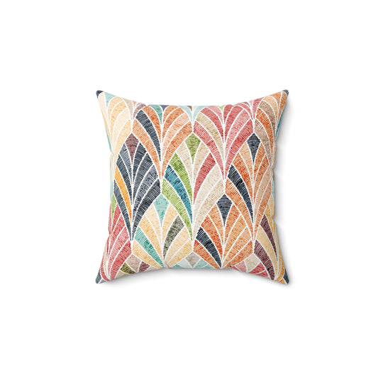Square throw pillow with multicolor leaf fan pattern on off-white background