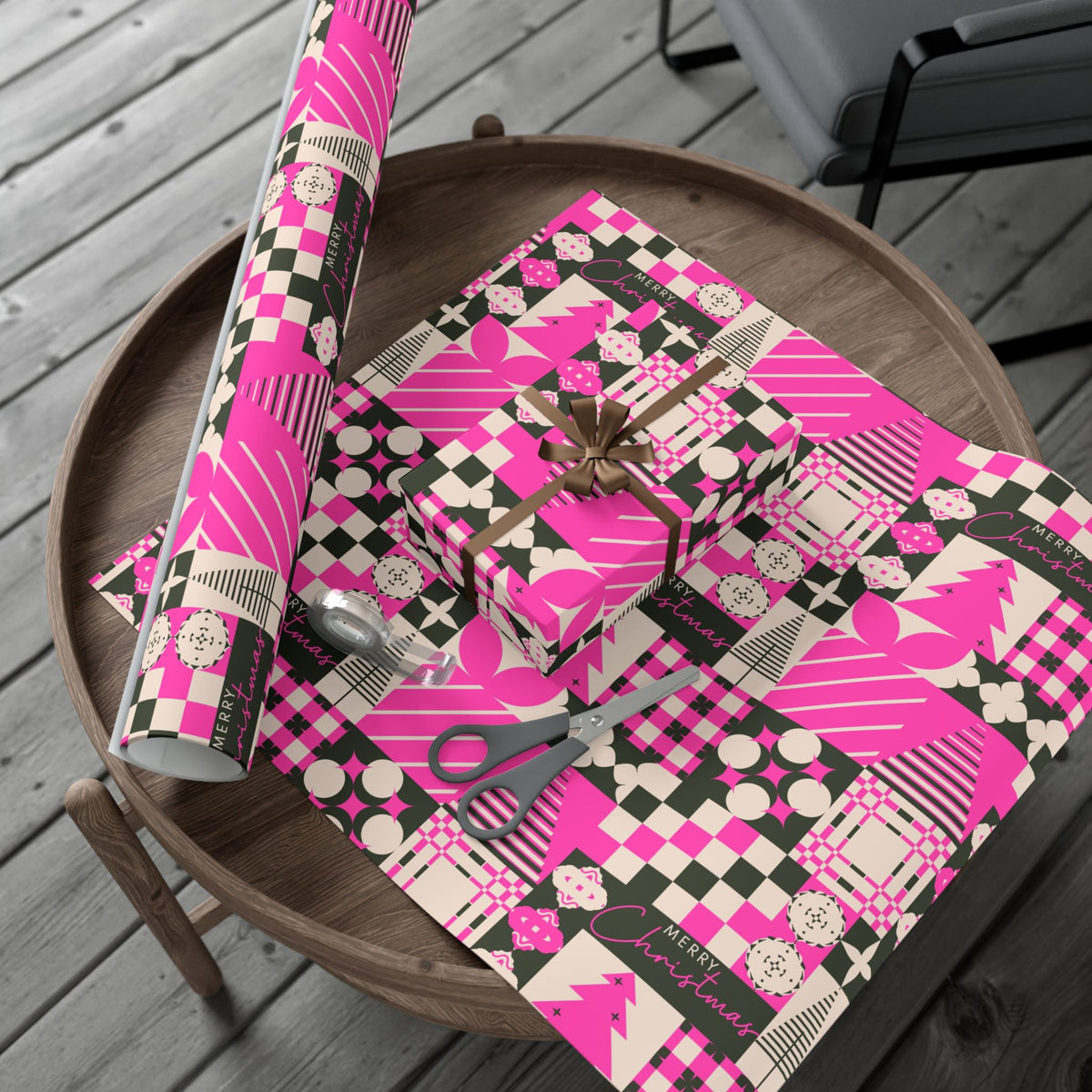 Wrapped gift showing Christmas gift wrap paper with pink plaid patchwork and bows