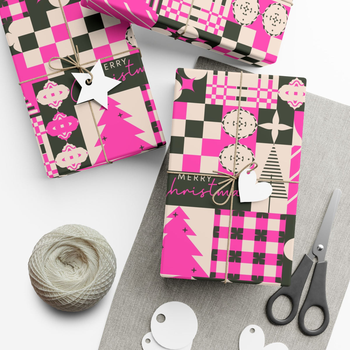 Christmas gift wrap paper set featuring pink plaid patchwork designs with icons