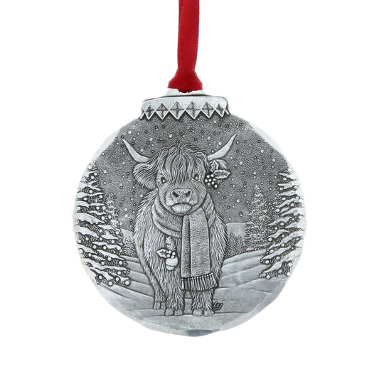 Grey cow Christmas ornament with hanging red ribbon and snowy etched design