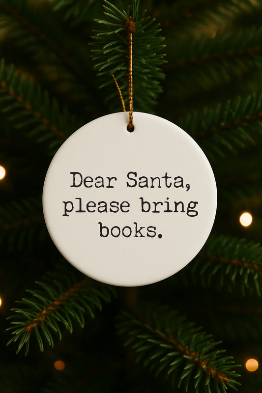 White round Christmas ornament with 'Dear Santa, please bring books.' text