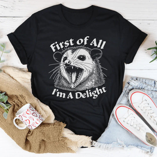Black graphic T-shirt with cat-face print and 'I'm A Delight' wording